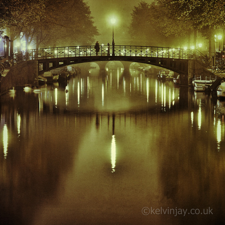 Misty bridge in Amsterdam